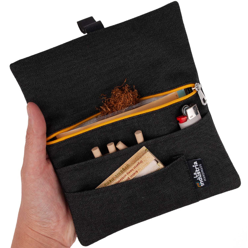 Water-repellent tobacco pouch for rolling tobacco and accessories